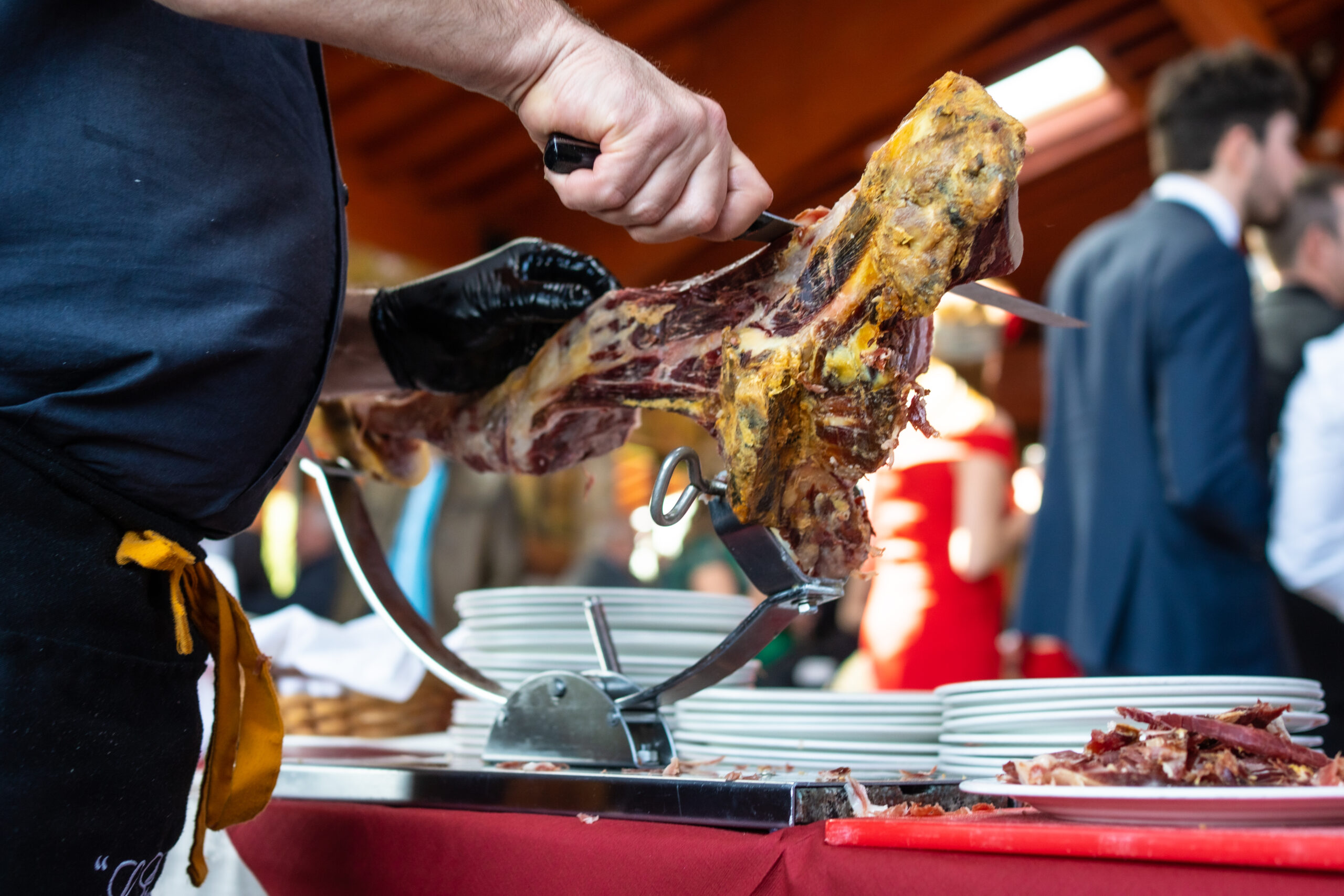 A Spanish ham cutter at an event or wedding